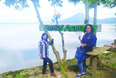 ‘Pantai Asmara’ Wisata Tepi Danau Dibawah Gunung Seminung