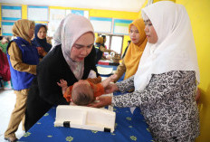 Partinia Tinjau Posyandu Pekon Bahway