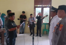 Plt.Camat Bangkunat Lantik Pj.Peratin Pekon Persiapan Kuta Mulya